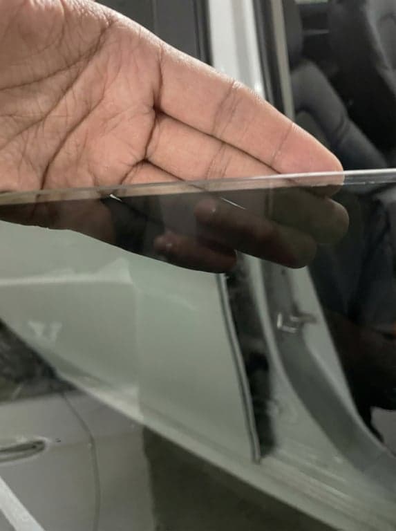 Macro window tint edge Calgary - poor installation showing visible 3mm gap light bleed standard workmanship
